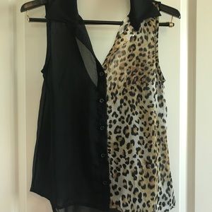 One sided animal print, button up sleeveless top.